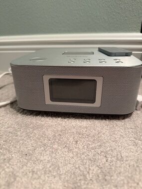 Brookstone Silver Portable Clock Radio Speaker